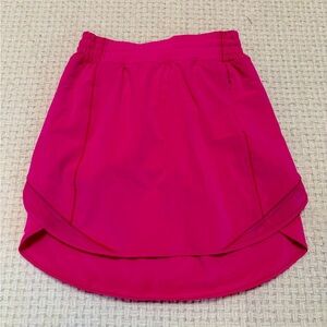 Lululemon pink skirt, women’s size 4.  Spandex lined.  EXCELLENT CONDITION